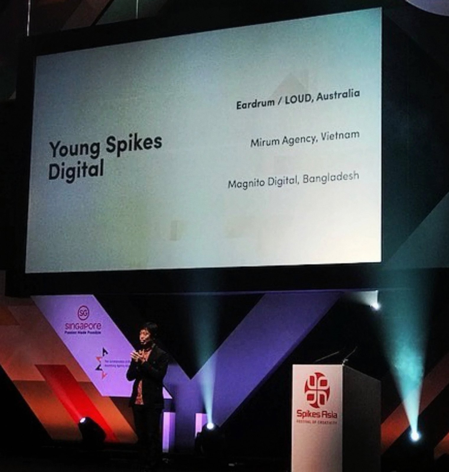 Ly speaking on stage at Spikes Asia in Singapore