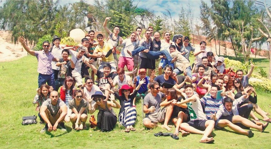 A big company outing on a sunny hill